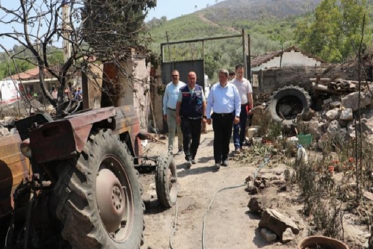 manisa saruhanlıda yangınzedelerin yanında